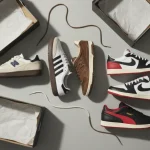 Modelli di sneaker da collezione con scatole di scarpe